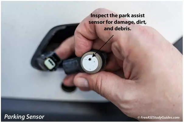 Changing a park assist sensor.