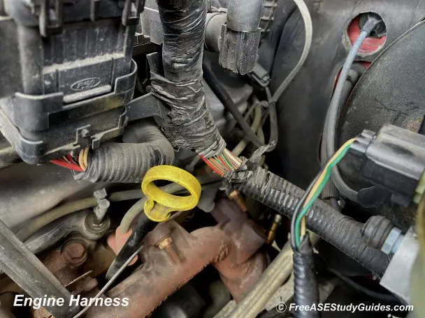 Exposed wiring of an engine harness.