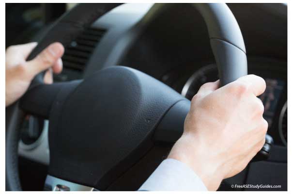 Steering wheel vibration caused by brake rotor wobble.